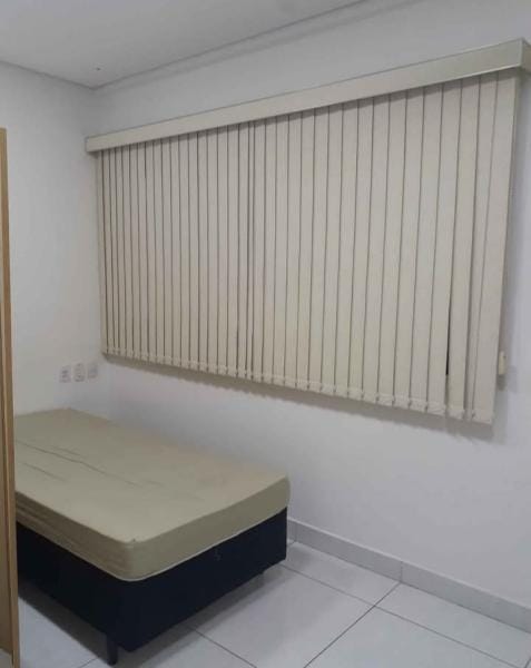 Vaga em quarto duplo para moça